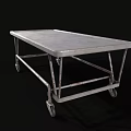 Sturdy Metal Medical Cart With Four Wheels And Flat Surface For Hospital Use