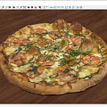 Freshly Baked Pizza Topped with Tomato Basil and Melted Cheese on Crispy Crust