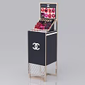 Chanel Display Shelf With Modern Design Gold Frame Black Body And Multiple Lipsticks