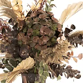 Natural Dried Flower Arrangement In Brown Vase With Green Leaves And Decorative Grasses