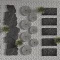 Garden Accents With Various Shaped Stone Slabs Circular Ornaments And Small Green Plants