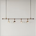 Modern Pendant Light Fixture With Metal Rod And Four Round Bulbs On White Wall