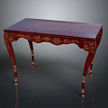 Red Wooden Table With Golden Carvings On Elegant Legs And Dark Top