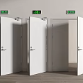 Interior View Of Three Open White Doors With Green Exit Signs Above