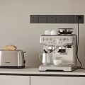 Silver Toaster And Coffee Machine On Kitchen Counter With Bread Cup And Milk Jug