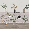 Various Floral Vases with Greenery and Ferns Arranged on Stone Steps