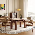 Elegant Round Dining Table Set With Beige Top Brown Legs Four Chairs And Decorative Vase
