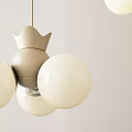 Elegant Modern Chandelier With Crown Top Design And Spherical White Bulbs Beige Frame