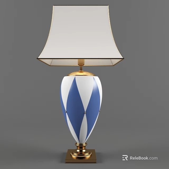 Elegant Table Lamp With White Lampshade And Blue White Diamond Pattern Base Golden Accents 3d model 