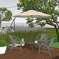 Outdoor Table and Chair Set With White Umbrella On Wooden Deck Surrounded by Green Trees