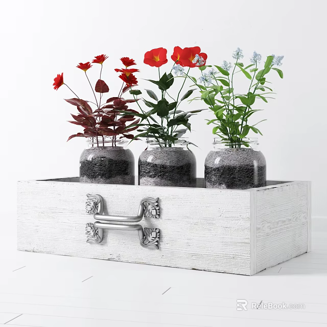 Glass Vases With Red Blue Flowers Green Leaves And Black Sand In White Wooden Box 3d model 