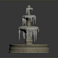 Three Tiered Decorative Fountain With Snow Covered Icicles Round Base And Blue Green Water