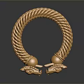 Gold Braided Bracelet With Intricate Dragon Head Decorations And Shiny Surface