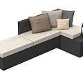 L shaped Outdoor Sofa with Black Frame Beige Cushions and Multiple Pillows Side Table Lantern