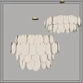 White Leaf Shaped Chandeliers with Golden Metal Frames Against Gray Wall Interior Design