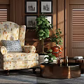 Beige Floral Armchair With Blue Cushion Green Plants Copper Table And Wooden Wall Artworks