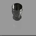 Silver Decorative Metal Cup With Intricate Carved Patterns And Ornate Base Design