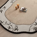 Decorative Oval Shaped Rug With Beige Center And Black Leaf Patterns On Wooden Floor