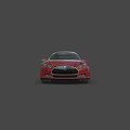 Red Tesla Electric Sedan Featuring Modern Sleek Exterior And Luxury Design