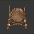 Brown Traditional Drum with Orange Wooden Stand and White Straps on Gray Brick Floor