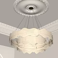 Modern Wave Shaped Cream Colored Chandelier Hanging In Ceiling With Decorative Moldings