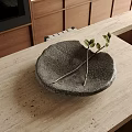 Modern Kitchen Countertop With Gray Ceramic Bowl And Green Foliage