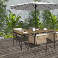 Outdoor Wooden Deck Dining Set With Wooden Table Woven Chairs Green Plants And Large Umbrella