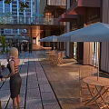 Vibrant Commercial Street With Outdoor Seating Umbrellas Pedestrians And Modern Buildings