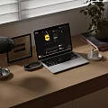 Laptop Setup On Wooden Desk With Desk Lamp Mouse Coffee Cup Potted Plant And Books