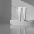 Two White Tubular Daily Washing Products on White Platform with Gray Background and Light Shadow