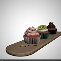 Colorful Decorated Cupcakes With Cream Kiwi Slice And Cherry On Wooden Tray