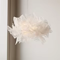 Soft White Hanging Chair With Fluffy Fabric Design For Cozy Indoor Living Space