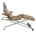 Electric Medical Treatment Table With Beige Leather Surface And Metal Frame