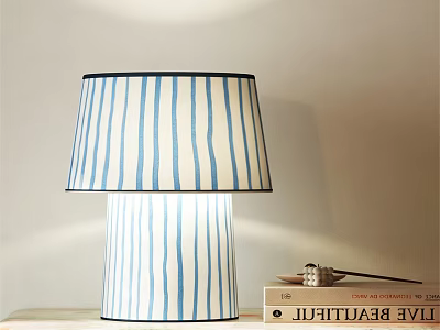 Blue White Striped Illuminated Table Lamp with Lampshade Base on Table with Books 3d model