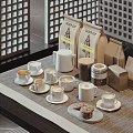 Stylish Coffee Cups With Coffee Pot Jars Cookies And Packaging On Table