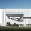 Modern Museum Building With White Stone Facade Overhanging Structure And Surrounding Greenery