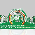 Commercial Equipment Exhibition Booth with Green Arched Structure and SPOIL YOURSELF Branding