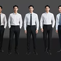 Men Standing in White Shirts Black Pants with Black and Blue Ties Against Dark Background
