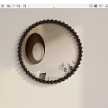Round Mirror with Black Beaded Frame on White Wall Reflecting Circular Object and Plant 3d model