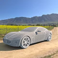 Silver Maserati Sports Car Parked On Dirt Road Near Yellow Flower Field And Mountains