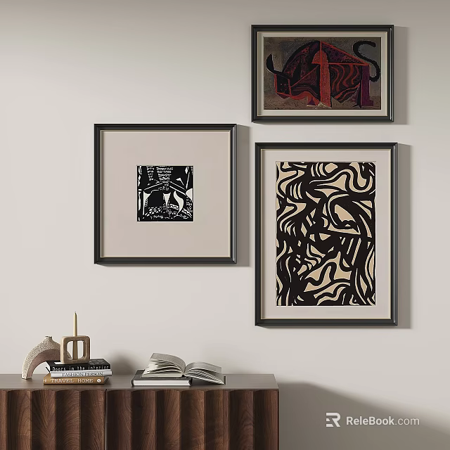Framed Abstract Paintings Hanging On Wall With Decorative Table And Books 3d model 