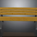 Wooden Bench With Yellow Slats And Metal Support Legs For Outdoor Use