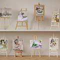 Various Wooden Easels With Colorful Paintings Arranged On Display Shelf