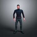 Man in Dark Blue Turtleneck Sweater Dark Pants and Black Shoes Standing Against Gray Background