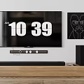 Modern Wall Mounted TV Displaying 1039 AM Time With Decorative Art And Soundbar System
