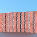 Red Brick Wall Structure With Vertical Bricks And Metal Frames Under Blue Sky 3d model