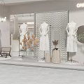 Elegant Modern Clothing Storefront With Window Display Mannequins And Dresses