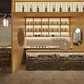 Japanese Restaurant Interior With Bar Counter Stone Top Wooden Wine Rack And Cherry Blossom Decor