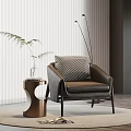 Stylish Accent Chair With Textured Pillow Round Side Table And White Blinds On Wooden Floor