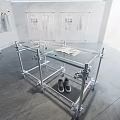 Modern Display Shelf With Glass Top Metal Frame Holding Magazine Shoes And Clothes